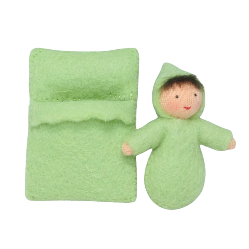 Baby with Green Swaddle · Fair