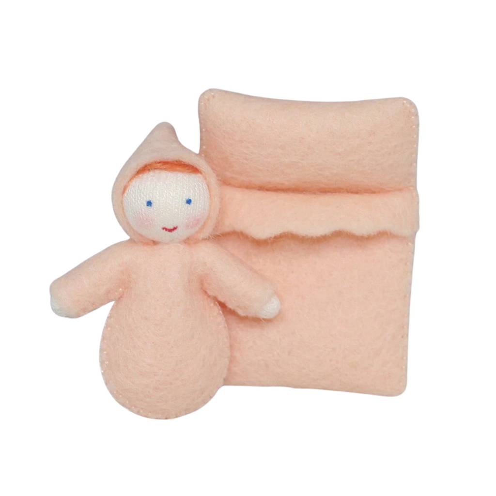 Baby with Peach Swaddle · White