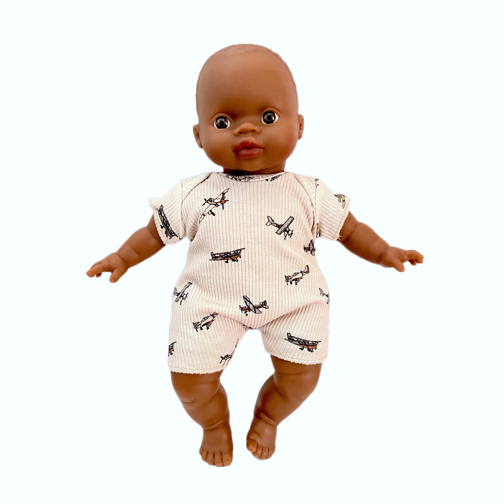 Minikane Soft Baby Boy Doll in Airplane Onesie  · Brown