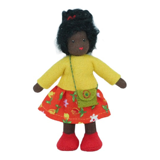 Waldorf Dollhouse Girl in Yellow Top and Floral Skirt · Black